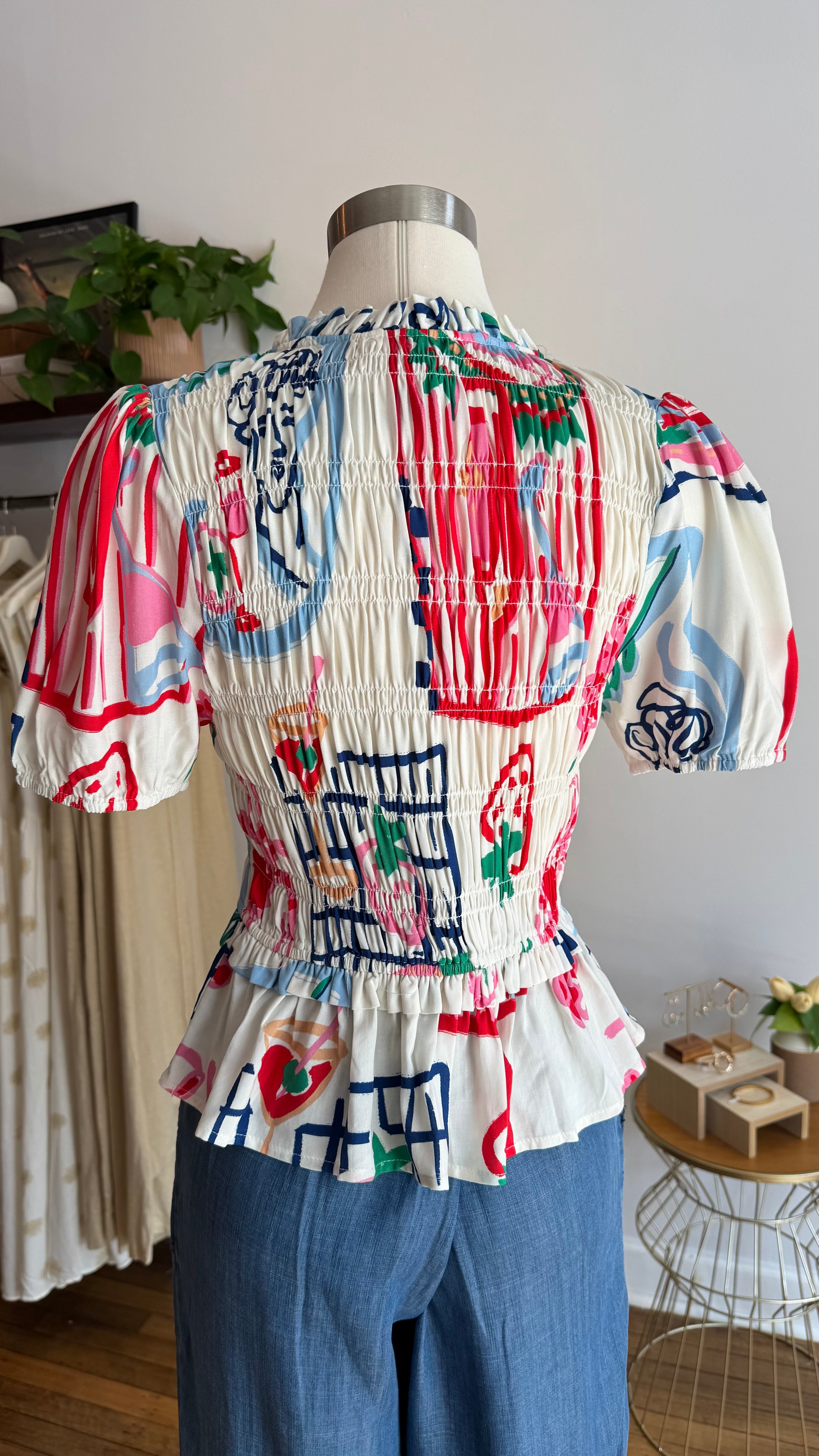 Smocked Printed Peplum Top