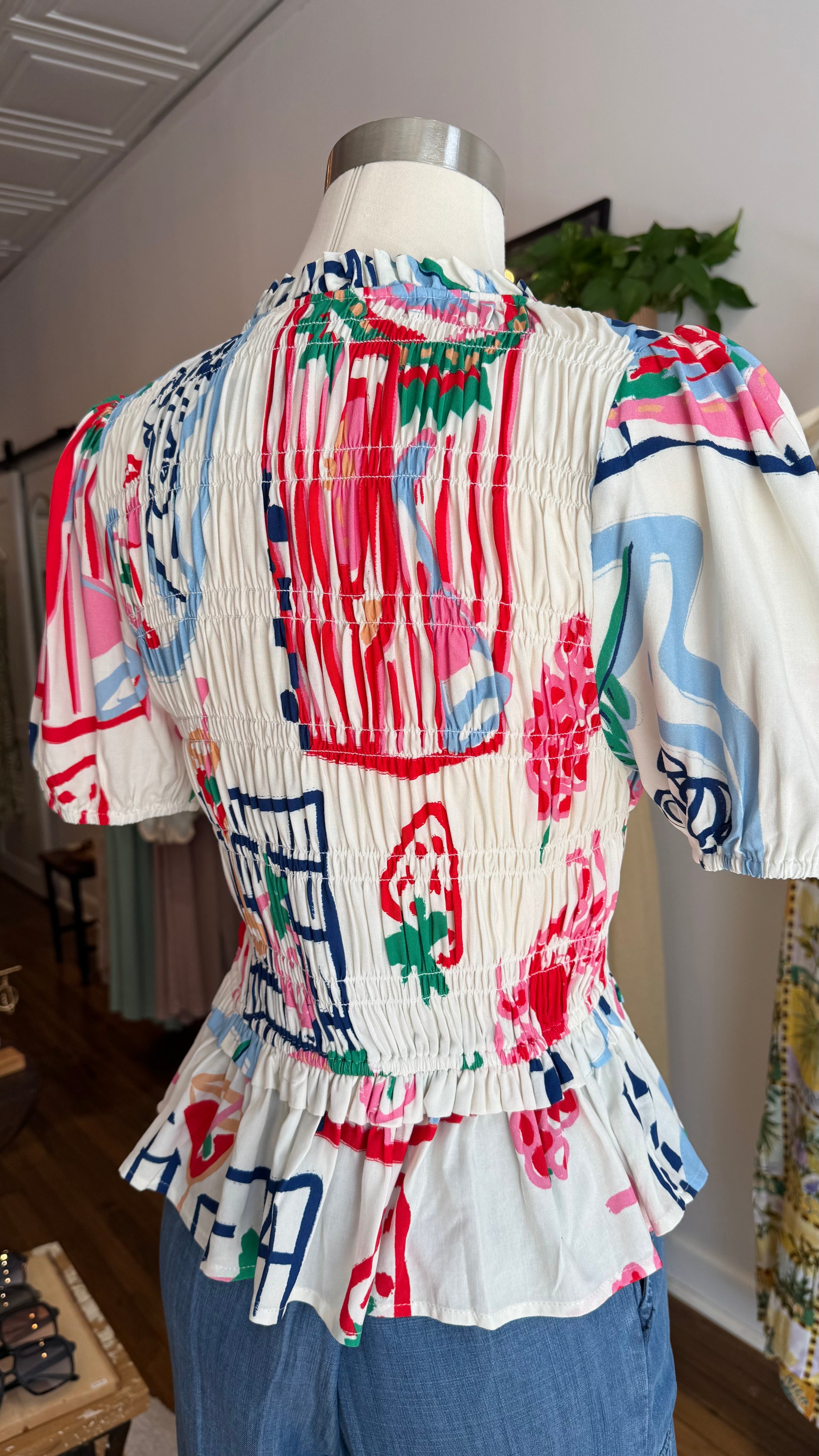 Smocked Printed Peplum Top
