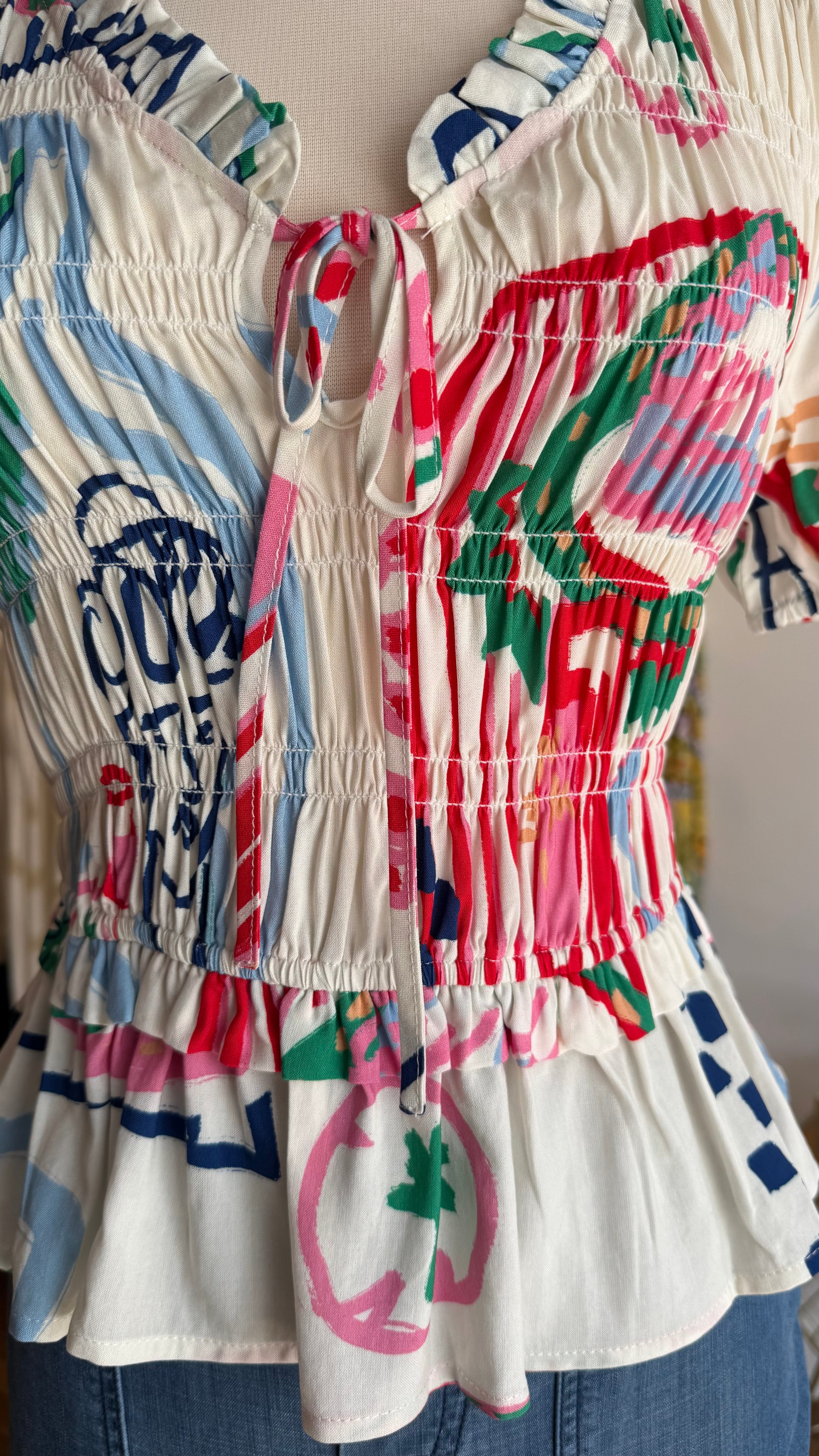Smocked Printed Peplum Top