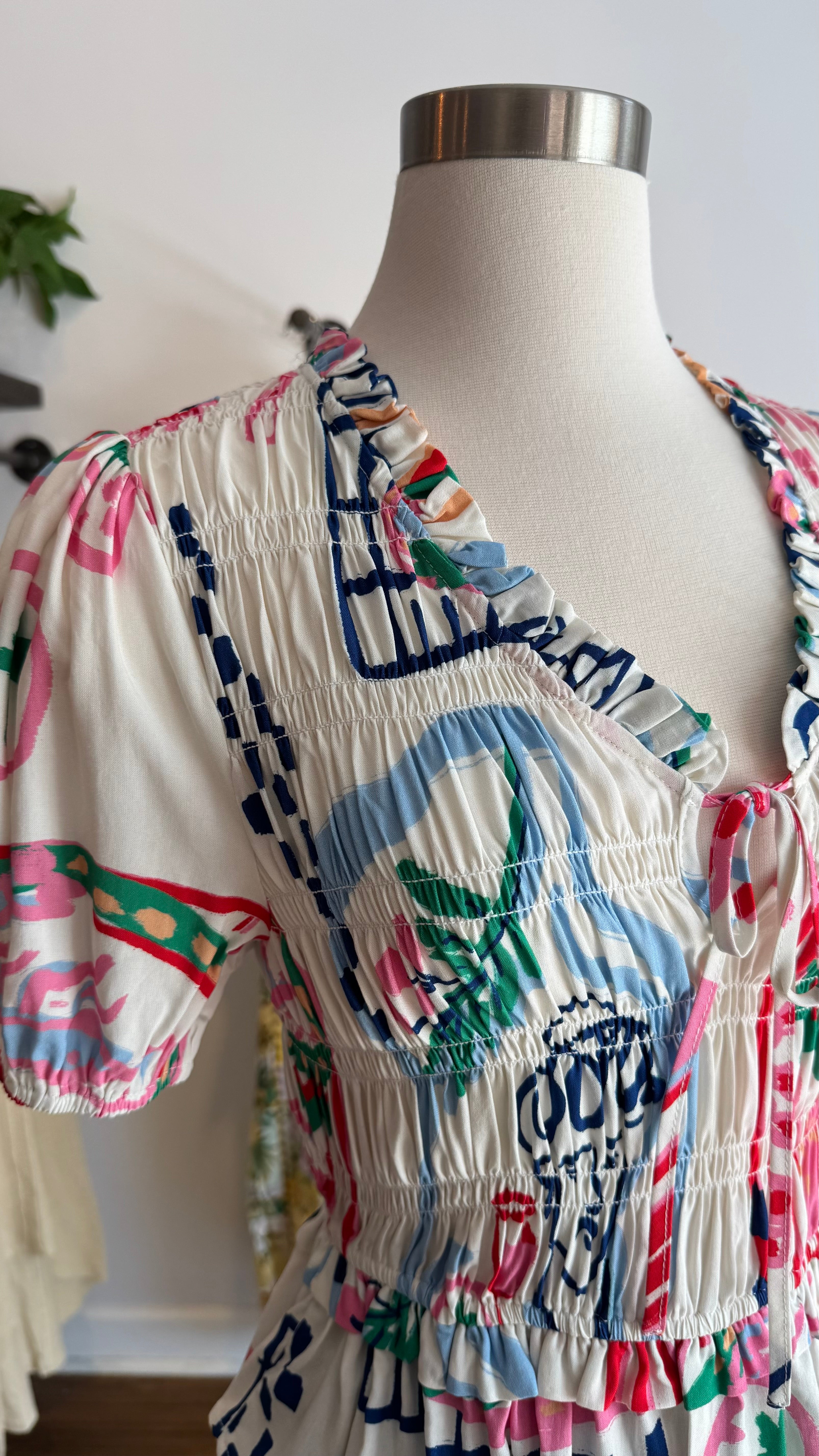 Smocked Printed Peplum Top